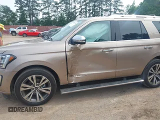 2020 Ford Expedition Platinum with VIN 1FMJU1MT6LEA51900, listed as a IAAI auction lot 42265591 with 70,022 mi miles and . Bid and sale history available at DreamBid. Image 6.
