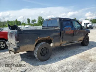 1999 Ford F-350 XL с VIN 1FTSW31F7XED41999, выставлен на аукционе Copart как лот 64244505 с пробегом 286 209 миль миль и Списание • Salvage title. История ставок и продаж доступна на DreamBid. Изображение 3.