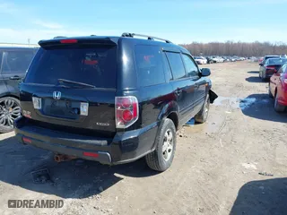 2007 Honda Pilot EX-L with VIN 5FNYF18787B029637, listed as a IAAI auction lot 41816373 with 305,036 mi miles. Bid and sale history available at carsss.com. Image 4.