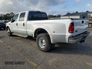 2001 Ford F-350 XL with VIN 1FTWW32F81ED76171, listed as a Copart auction lot 85030524 with 294,338 mi miles and Salvage title. Bid and sale history available at DreamBid. Image 2.