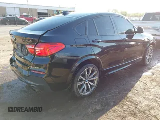 2016 BMW X4 M40i z VIN 5UXXW7C59G0M91223, wystawiony jako IAAI lot #42009394 z przebiegiem 144 771 mil mil oraz . Historia ofert i sprzedaży dostępna na DreamBid. Obrazek 4.
