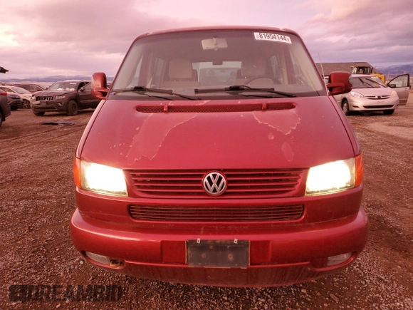 2003 Volkswagen EuroVan с VIN WV2KB47093H015569, выставлен на аукционе Copart как лот 81954144 с пробегом 166 304 миль миль и Чистый • Clean title. История ставок и продаж доступна на DreamBid. Изображение 5.