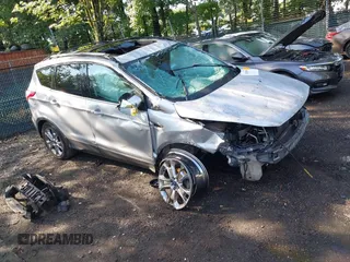 2013 Ford Escape SEL with VIN 1FMCU0HX9DUA20115, listed as a IAAI auction lot 42839509 with 115,072 mi miles and . Bid and sale history available at DreamBid. Image 1.