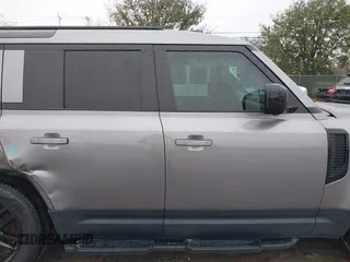 2024 Land Rover Defender with VIN SALEJEEU9R2312923, listed as a IAAI auction lot 41548930 with 104,449 mi miles and . Bid and sale history available at DreamBid. Image 14.