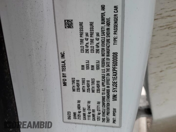 2023 Tesla Model 3 with VIN 5YJ3E1EAXPF600008, listed as a Copart auction lot 51868055 with 58,733 mi miles and Salvage title. Bid and sale history available at DreamBid. Image 12.