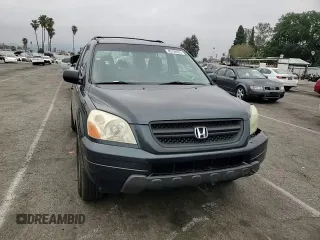 2005 Honda Pilot LX z VIN 2HKYF18125H505956, wystawiony jako Copart lot #49728655 z przebiegiem 275 696 mil mil oraz Szkoda całkowita • Salvage title. Historia ofert i sprzedaży dostępna na DreamBid. Obrazek 11.