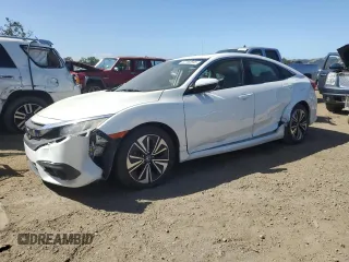 2016 Honda Civic EX-T z VIN 2HGFC1F36GH635501, wystawiony jako Copart lot #57162945 z przebiegiem Nie podano mil oraz Szkoda całkowita • Salvage title. Historia ofert i sprzedaży dostępna na DreamBid. Obrazek 1.