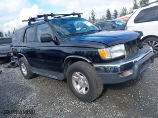 2000 Toyota 4Runner SR5 with VIN JT3HN86R1Y0322493, listed as a IAAI auction lot 41938857 with 121,124 mi miles. Bid and sale history available at carsss.com. Image 1.