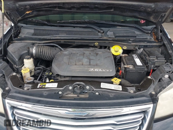 2014 Chrysler Town & Country Touring with VIN 2C4RC1BG8ER296073, listed as a IAAI auction lot 42164103 with 129,006 mi miles and . Bid and sale history available at DreamBid. Image 10.