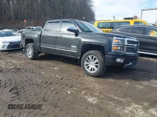 2015 Chevrolet Silverado 1500 High Country with VIN 3GCUKTEC3FG506216, listed as a IAAI auction lot 41672433 with 77,653 mi miles and . Bid and sale history available at DreamBid. Image 1.