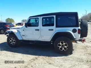 2023 Jeep Wrangler Rubicon with VIN 1C4HJXFG8PW655138, listed as a IAAI auction lot 41674959 with 40,790 mi miles and . Bid and sale history available at DreamBid. Image 14.