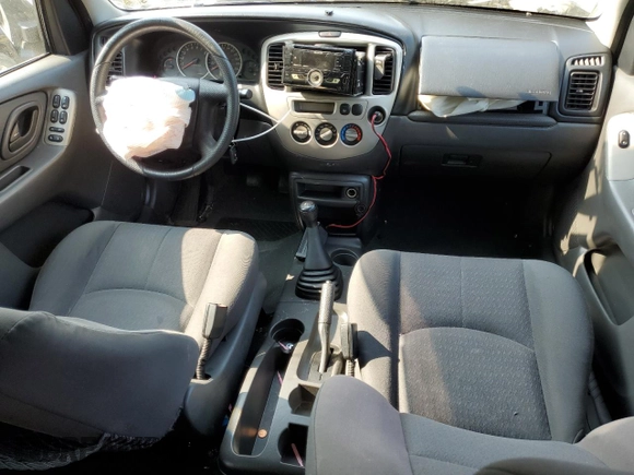 2003 Mazda Tribute DX with VIN 4F2YZ02B83KM52472, listed as a Copart auction lot 68642804 with 179,193 mi miles and Salvage Title. Bid and sale history available at carsss.com. Image 8.