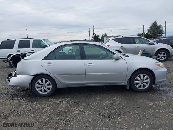 2004 Toyota Camry LE with VIN 4T1BF32K44U585697, listed as a IAAI auction lot 41625006 with 223,434 mi miles. Bid and sale history available at carsss.com. Image 14.