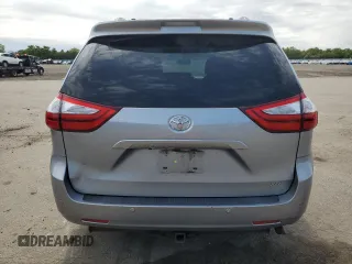 2015 Toyota Sienna XLE with VIN 5TDYK3DC2FS529006, listed as a Copart auction lot 62750995 with 142,990 mi miles and Salvage title. Bid and sale history available at DreamBid. Image 6.