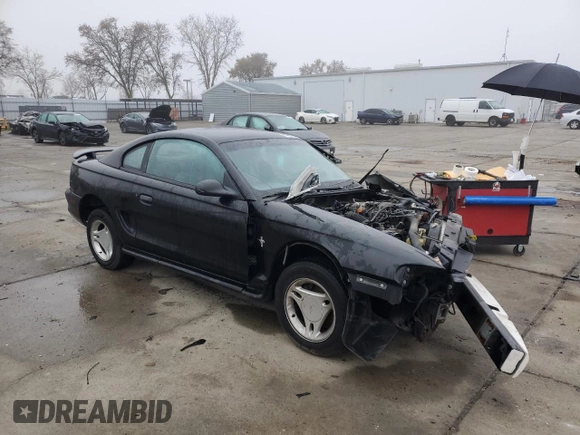 1997 Ford Mustang with VIN 1FALP4049VF136060, listed as a Copart auction lot 85389824 with 0 mi miles and Salvage Title. Bid and sale history available at carsss.com. Image 4.