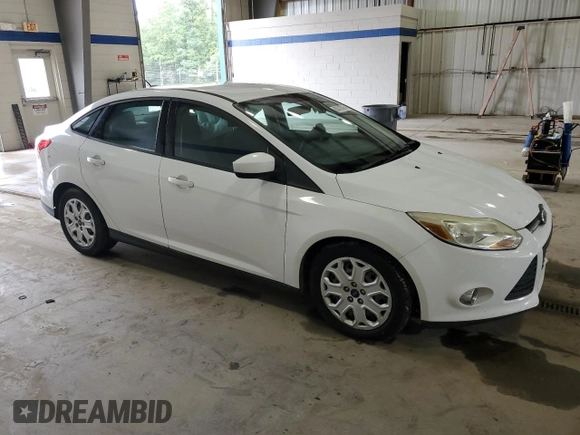 2012 Ford Focus SE with VIN 1FAHP3F20CL451852, listed as a Copart auction lot 60310765 with 150,305 mi miles and Salvage title. Bid and sale history available at DreamBid. Image 4.