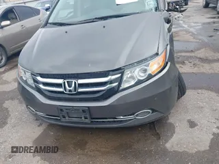 2016 Honda Odyssey Touring Elite with VIN 5FNRL5H97GB010048, listed as a IAAI auction lot 40212711 with 119,009 mi miles and . Bid and sale history available at DreamBid. Image 12.