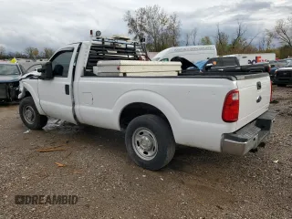 2013 Ford F-250 XL with VIN 1FTBF2A65DEA63805, listed as a Copart auction lot 63109464 with 199,691 mi miles and Salvage Title. Bid and sale history available at DreamBid. Image 2.