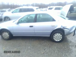 1997 Toyota Camry LE z VIN 4T1BG22K8VU108750, wystawiony jako IAAI lot #41706625 z przebiegiem 296 386 mil mil oraz . Historia ofert i sprzedaży dostępna na DreamBid. Obrazek 15.