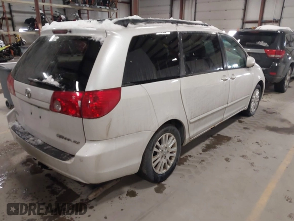 2007 Toyota Sienna XLE with VIN 5TDZK22C57S002919, listed as a IAAI auction lot 41563961 with 262,988 mi miles. Bid and sale history available at carsss.com. Image 4.