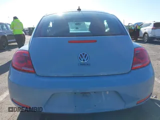 2014 Volkswagen Beetle 2.5L w/Sun with VIN 3VWJP7AT6EM601318, listed as a IAAI auction lot 41902598 with 169,220 mi miles and . Bid and sale history available at DreamBid. Image 16.