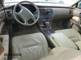 1998 Infiniti Q45 z VIN JNKBY31A8WM403038, wystawiony jako Copart lot #86904484 z przebiegiem 136 142 mil mil oraz Szkoda całkowita • Salvage title. Historia ofert i sprzedaży dostępna na DreamBid. Obrazek 8.