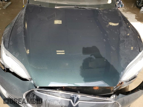 2013 Tesla Model S with VIN 5YJSA1DN1DFP12218, listed as a Copart auction lot 54717725 with Not Provided miles and Non Repairable. Bid and sale history available at carsss.com. Image 12.