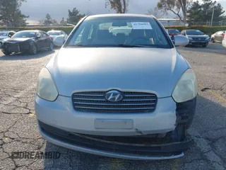 2006 Hyundai Accent GLS with VIN KMHCN46C86U007833, listed as a IAAI auction lot 41760603 with 60,030 mi miles. Bid and sale history available at carsss.com. Image 12.