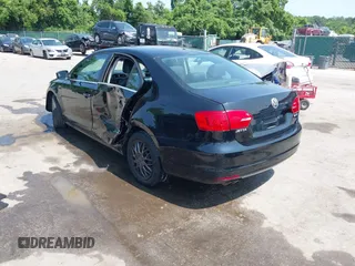 2013 Volkswagen Jetta SE with VIN 3VWDP7AJ4DM415061, listed as a IAAI auction lot 42414027 with 192,577 mi miles and . Bid and sale history available at DreamBid. Image 3.