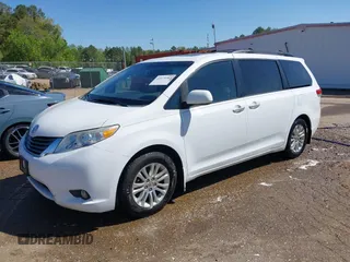 2014 Toyota Sienna XLE z VIN 5TDYK3DC7ES431782, wystawiony jako IAAI lot #41975182 z przebiegiem 191 870 mil mil oraz . Historia ofert i sprzedaży dostępna na DreamBid. Obrazek 20.