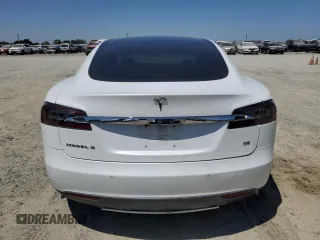 2014 Tesla Model S 60 with VIN 5YJSA1H19EFP58677, listed as a Copart auction lot 61446345 with 150,152 mi miles and Salvage title. Bid and sale history available at DreamBid. Image 6.
