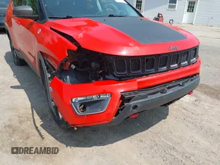 2018 Jeep Compass Trailhawk z VIN 3C4NJDDBXJT334496, wystawiony jako IAAI lot #42400835 z przebiegiem 188 896 mil mil oraz . Historia ofert i sprzedaży dostępna na DreamBid. Obrazek 6.