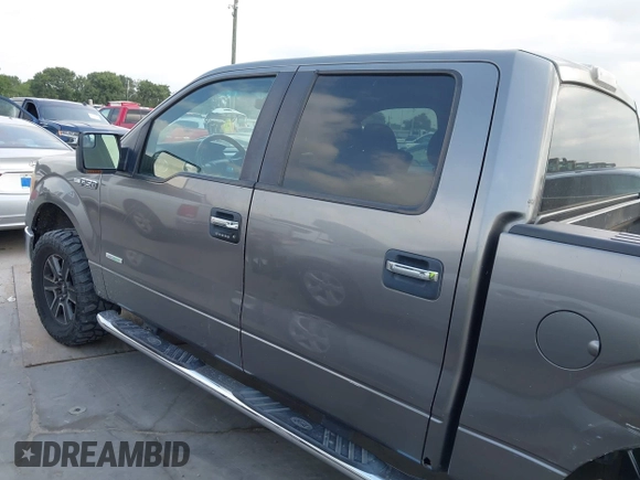 2014 Ford F-150 XL with VIN 1FTFW1CTXEKF35966, listed as a IAAI auction lot 42120360 with 140,174 mi miles and . Bid and sale history available at DreamBid. Image 14.