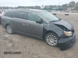 2011 Honda Odyssey EX with VIN 5FNRL5H49BB082706, listed as a IAAI auction lot 42080414 with 228,176 mi miles and . Bid and sale history available at carsss.com. Image 1.