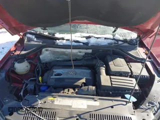 2013 Volkswagen Tiguan S with VIN WVGAV3AX2DW063067, listed as a IAAI auction lot 41638749 with 150,115 mi miles and . Bid and sale history available at DreamBid. Image 10.