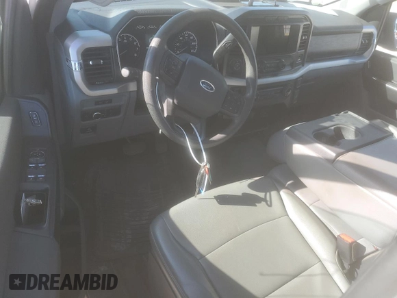 2021 Ford F-150 XL with VIN 1FTEX1C59MFD09404, listed as a Copart auction lot 87176314 with 93,801 mi miles and Salvage title. Bid and sale history available at DreamBid. Image 8.