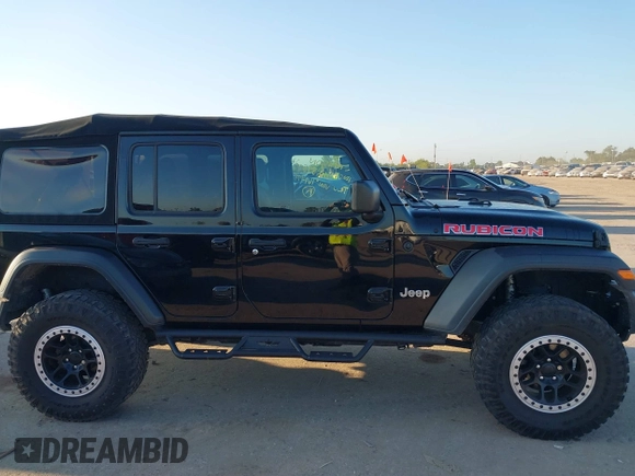 2018 Jeep Wrangler Unlimited Sport S z VIN 1C4HJXDG9JW169478, wystawiony jako IAAI lot #40387425 z przebiegiem 59 287 mil mil oraz . Historia ofert i sprzedaży dostępna na DreamBid. Obrazek 13.