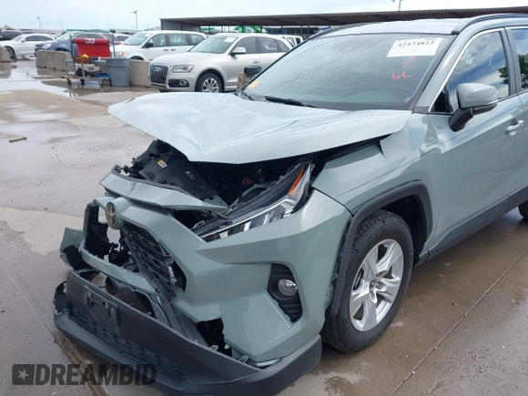 2021 Toyota RAV4 XLE with VIN 2T3P1RFV6MW216410, listed as a IAAI auction lot 42474822 with 37,503 mi miles and . Bid and sale history available at DreamBid. Image 6.