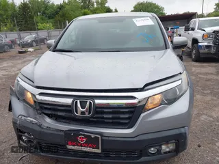 2018 Honda Ridgeline RTL with VIN 5FPYK3F52JB002649, listed as a IAAI auction lot 42338360 with 68,802 mi miles and . Bid and sale history available at DreamBid. Image 12.