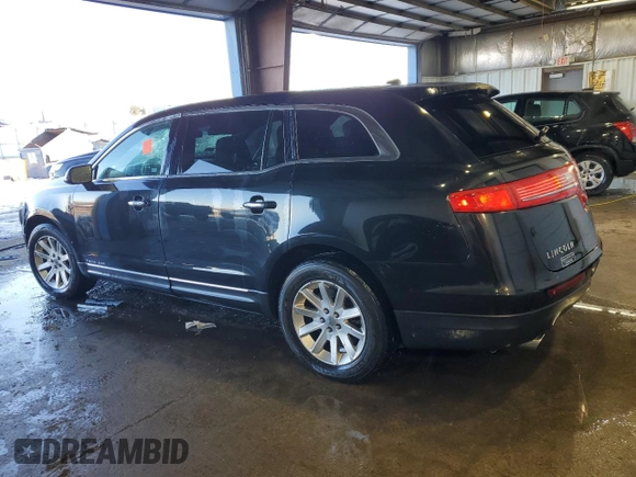 2015 Lincoln MKT with VIN 2LMHJ5NK4FBL01062, listed as a Copart auction lot 46111995 with 76,509 mi miles and Salvage Title. Bid and sale history available at DreamBid. Image 2.