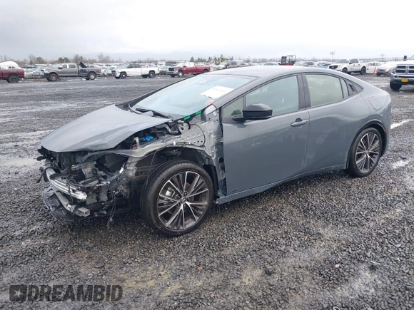 2024 Toyota Prius LE z VIN JTDADABU4R3015000, wystawiony jako IAAI lot #41147221 z przebiegiem 4 411 mil mil oraz . Historia ofert i sprzedaży dostępna na DreamBid. Obrazek 18.