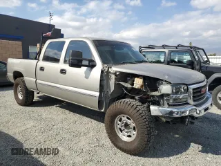 2003 GMC Sierra 1500HD SLE z VIN 1GTGC13U83F159358, wystawiony jako Copart lot #78096954 z przebiegiem 163 013 mil mil oraz Szkody całkowita. Historia ofert i sprzedaży dostępna na DreamBid. Obrazek 4.