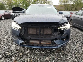 2019 Volvo XC60 Momentum with VIN LYV102RK0KB298964, listed as a Copart auction lot 54860385 with 83,143 mi miles and Salvage title. Bid and sale history available at DreamBid. Image 5.