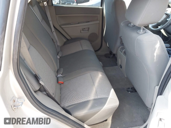 2008 Jeep Grand Cherokee Laredo with VIN 1J8GR48K28C169859, listed as a IAAI auction lot 41965149 with 166,069 mi miles. Bid and sale history available at carsss.com. Image 8.