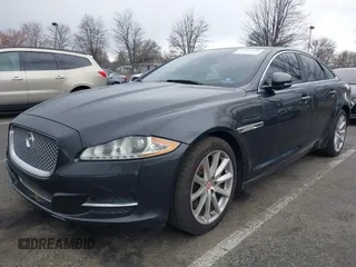 2014 Jaguar XJ with VIN SAJWA1CZ0E8V73966, listed as a IAAI auction lot 41887234 with 120,804 mi miles and . Bid and sale history available at DreamBid. Image 2.