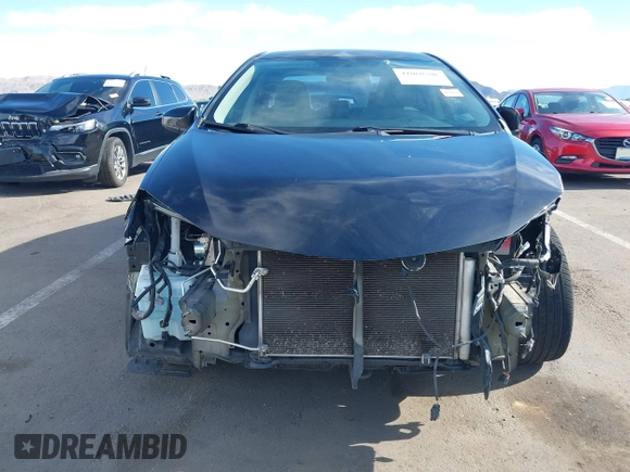 2016 Toyota Corolla L with VIN 5YFBURHE5GP383533, listed as a IAAI auction lot 42068306 with 144,048 mi miles and . Bid and sale history available at DreamBid. Image 6.