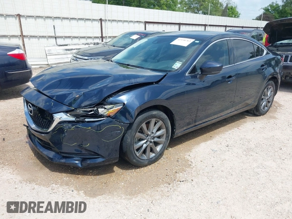 2018 Mazda 6 Sport with VIN JM1GL1UM7J1334658, listed as a IAAI auction lot 41938763 with 129,563 mi miles. Bid and sale history available at carsss.com. Image 2.
