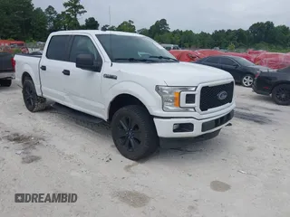 2020 Ford F-150 XL with VIN 1FTEW1EP3LFA05453, listed as a IAAI auction lot 42644402 with 163,933 mi miles and . Bid and sale history available at DreamBid. Image 1.