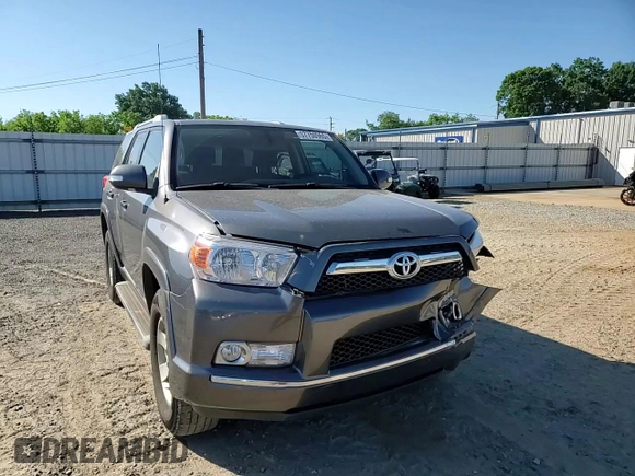 2011 Toyota 4Runner Trail z VIN JTEBU5JR6B5039779, wystawiony jako Copart lot #57750965 z przebiegiem 199 116 mil mil oraz Szkoda całkowita • Salvage title. Historia ofert i sprzedaży dostępna na DreamBid. Obrazek 14.