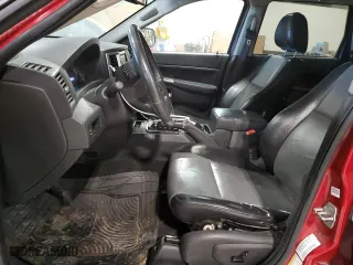 2010 Jeep Grand Cherokee Laredo with VIN 1J4RR4GT9AC123357, listed as a Copart auction lot 45280355 with 188,050 mi miles and Clean Title. Bid and sale history available at carsss.com. Image 7.